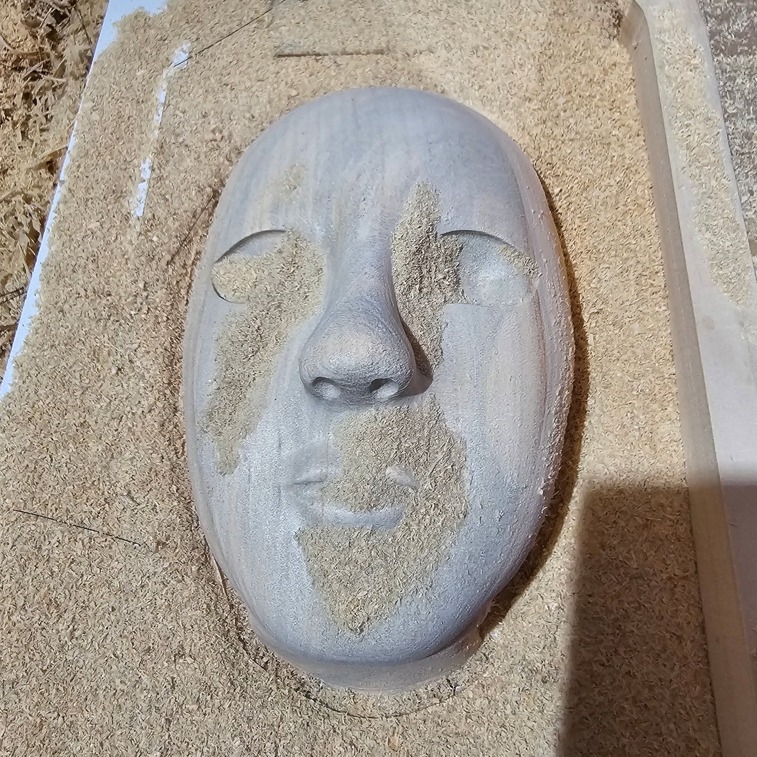 carved timber face